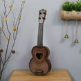 thumbnail image 5 of RnemiTe-amo Soprano Ukulele for Beginners,Kids Guitar Ukulele Beginner, Musical Instrument 22 Inches With 4 Strings, Starter Ukelele Four String Wood Hawaii Wood Uke,Brown, 5 of 6