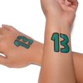 thumbnail image 1 of Paquete de 6 – Concierto de la gira de tatuajes temporales “13” - Tatuaje removible, traje de concierto, 1 of 4