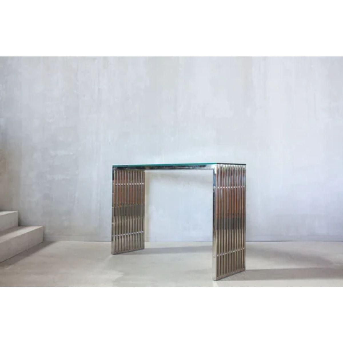 Deanna Slate Console Table made of stainless steel with clear glass top