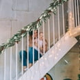 thumbnail image 4 of Artificial Christmas Garland 6.5Ft - Realistic Flocked Pine Greenery for Stair Railing, Mantel, Fireplace, Front Door, Holiday Party Decor with Green Cones, 4 of 6