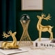 thumbnail image 5 of Cateissary Juego de 2 uds de adornos de ciervo para el hogar, diseño de escena pequeña interesante, decoración de de alce, figurita de Decoración del hogar Dorado, 5 of 6