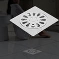 thumbnail image 1 of Desagüe de piso de aleación de zinc, desagüe de piso de baño de aleación de zinc simple, desagüe de piso cuadrado, diseño aerodinámico, 1 of 11