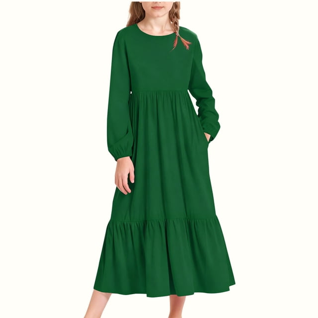 Vestido infantil de poliéster de manga larga, cuello redondo, bolsillos laterales y falda larga.