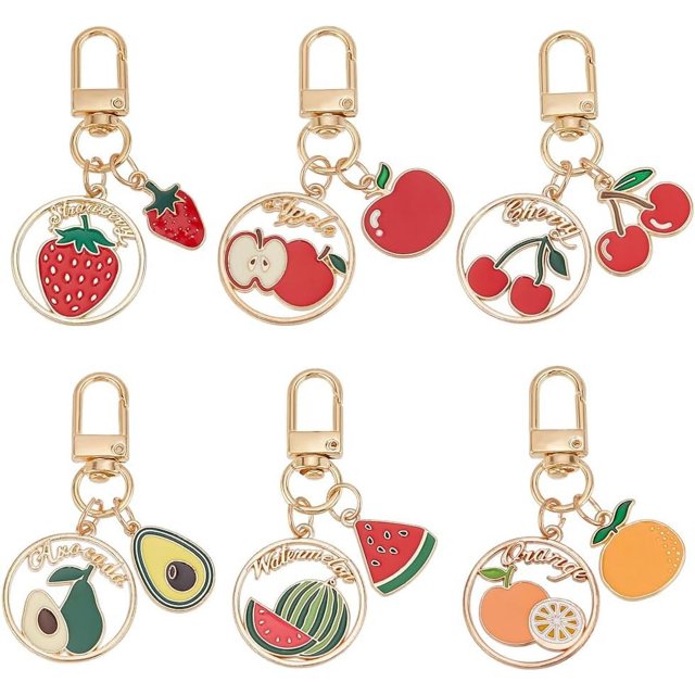 6 estilos de llaveros de frutas: llavero de cereza, llavero de fresa, llavero con dije de naranja, llavero dorado, dijes para bolso.