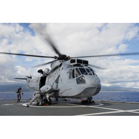 Royal Navy Sea King - LAMINATED POSTER 080713-N-9671T-069 HMAS Tobruk- Royal Australian Navy (RAN) sailors tie a RAN SH-3 Sea King during f Poster Print 24 x 36