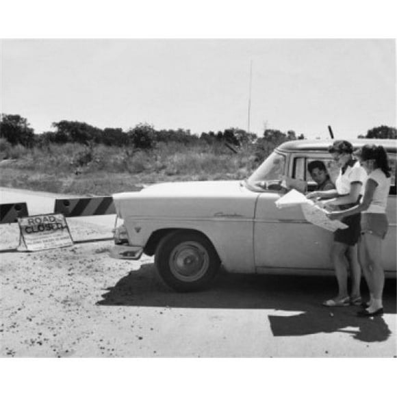 Posterazzi SAL2558460 Mother & Daughter Looking at Map Near Closed Road Sign Poster Print - 18 x 24 in.