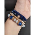 thumbnail image 2 of Set de 4 pulseras en colores azul rey, varios modelos con dije, 2 of 7