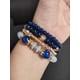 thumbnail image 2 of Set de 4 pulseras en colores azul rey, varios modelos con dije, 2 of 7