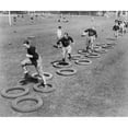 thumbnail image 2 of West Point'S Football Squad High Stepping Through A Maze Of Tires During Their First Practice. 1920S., 2 of 2