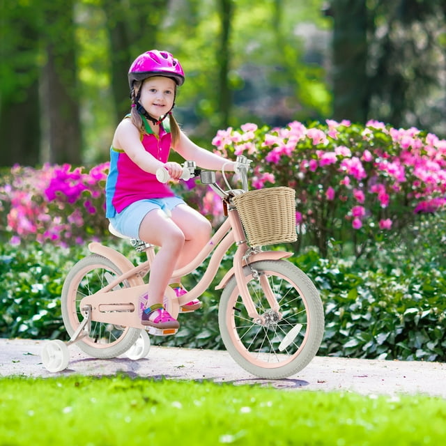 Gymax Vélo pour Enfants Rétro de 16 Pieds' en Rose avec Guidon et Siège Réglables en Hauteur, Montré à l'Extérieur sur un Sentier Pavé Entouré de Fleurs Vibrantes. le Vélo Présente un Cadre en Acier au Carbone, des Roues Stabilisatrices Doubles, un Siège Coussiné et un Panier avant en Osier pour Transporter des Jouets Ou des Collations. Conçu pour les Enfants de 4 à 7 Ans, Il Comprend des Pneus en Caoutchouc Antidérapants, un Frein en V et un Frein à Rétropédalage pour la Sécurité.