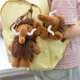 thumbnail image 5 of Lindo muñeco de peluche con orejas grandes y colmillos | Juguete suave antiestrés | Reposamuñecas de escritorio y llavero decorativo para bolso | 24 cm de largo (acostado), 5 of 6