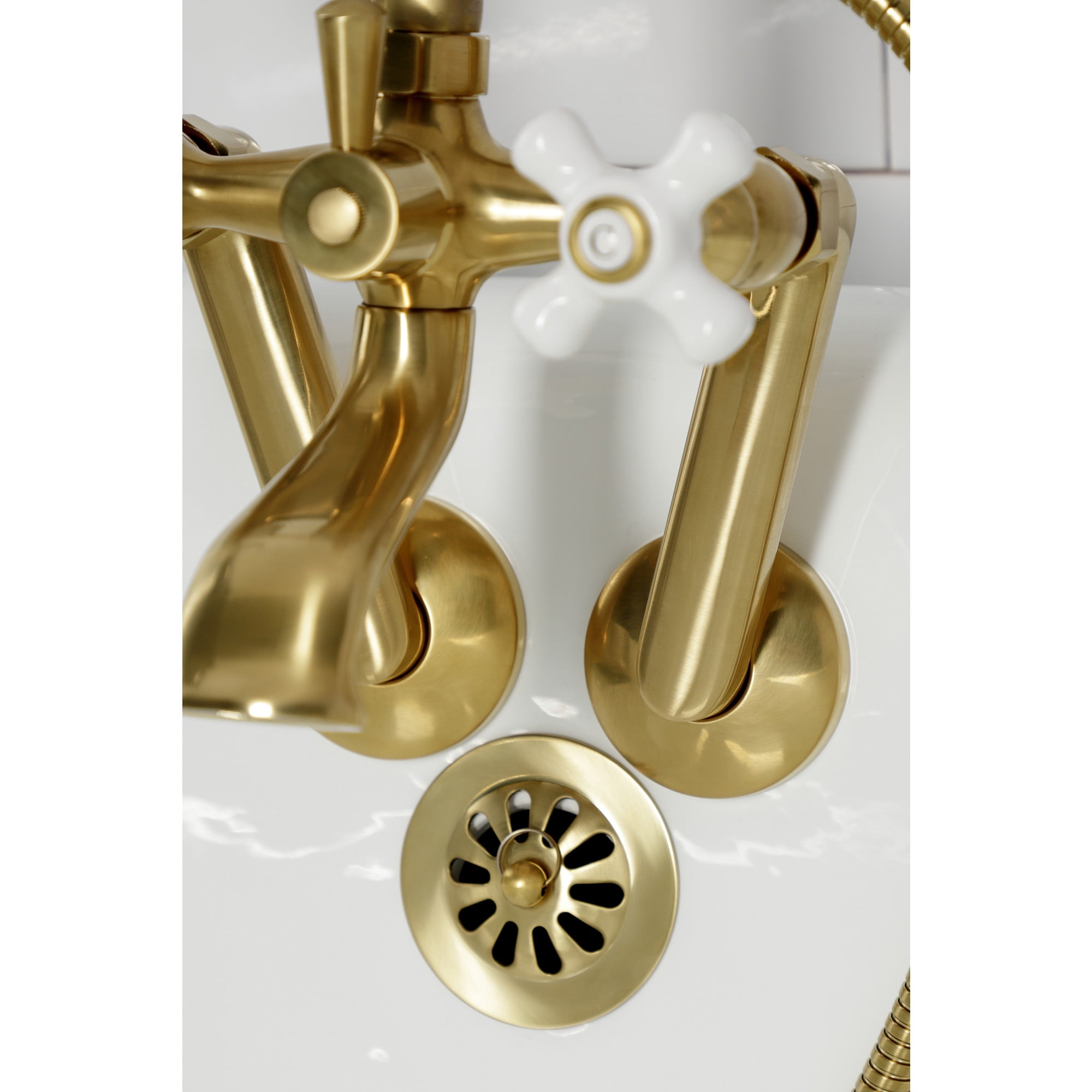 Kingston Brass KS269PXSB Kingston Three-Handle 2-Hole Tub Wall Mount Clawfoot Tub Faucet with Hand Shower in Brushed Brass
