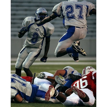 Canvas Print Football Team Leaping Competition Players Jumping Stretched Canvas 10 x
