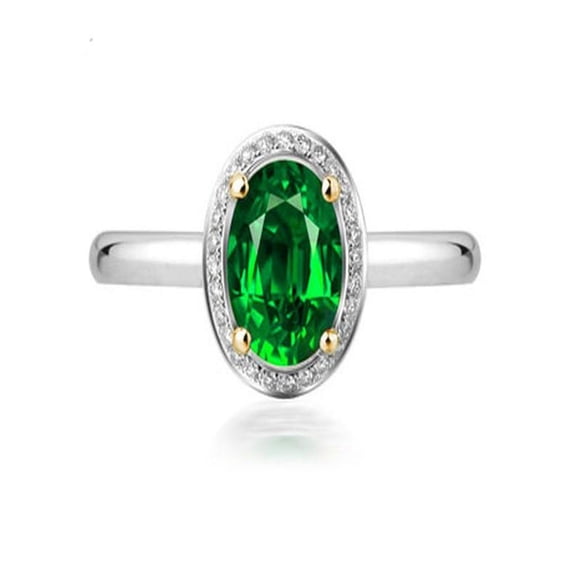 1 Carat oval cut Emerald and Diamond Halo Engagement Ring in White Gold