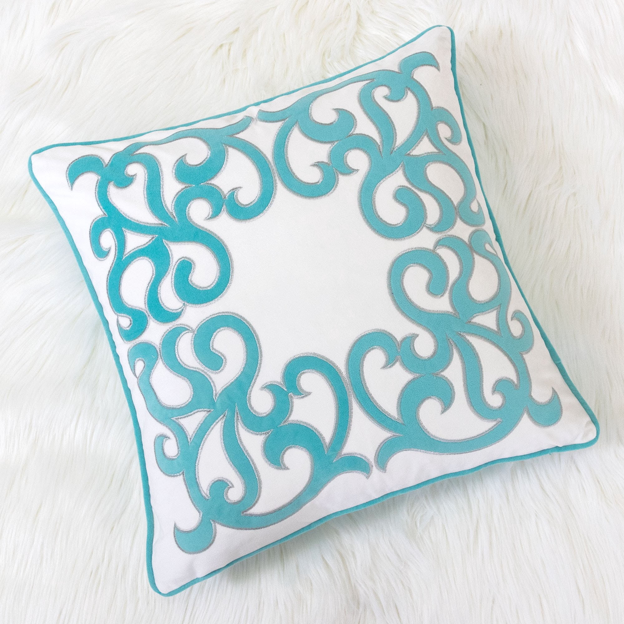 Jordan Turquoise Geometric Polyester 20 in. x 20 in. Throw Pillow