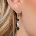 thumbnail image 3 of Gem Stone King 18K Rose Gold Plated Silver Green Chrome Diopside 3 Stone Dangle Earrings for Women (5.50 Cttw, Gemstone Birthstone, Oval 8X6MM, 7X5MM and 6X4MM), 3 of 6