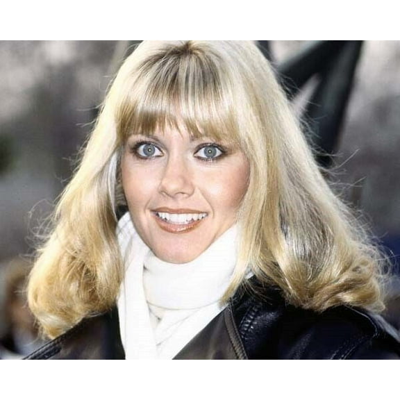 Olivia Newton John with beautiful smile in jacket and scarf 8x10 inch photo