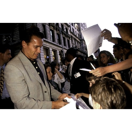Nfl Autograph Signings - Arnold Schwarzenegger signing autographs Photo Print