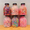 thumbnail image 3 of Riguas 1 Bottle Hair Ties 1000 Pcs Multi Colors Disposable Mini Hair Rings Children Girls Rubber Bands Sweet Color Elastic Large Quantity Hair Bands with Storage Bottle, 3 of 6