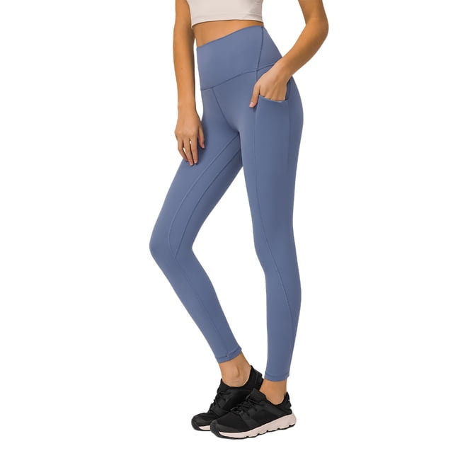 Pantalones de yoga de alto rendimiento con bolsillos laterales: leggings deportivos, nailon y spandex, ajuste ceñido y sujeción.