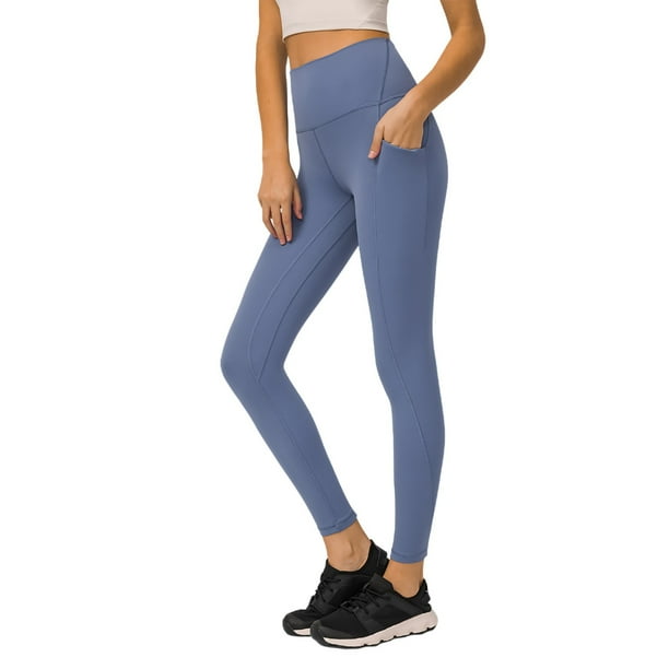 Pantalones de yoga de alto rendimiento con bolsillos laterales: leggings deportivos, nailon y spandex, ajuste ceñido y sujeción.