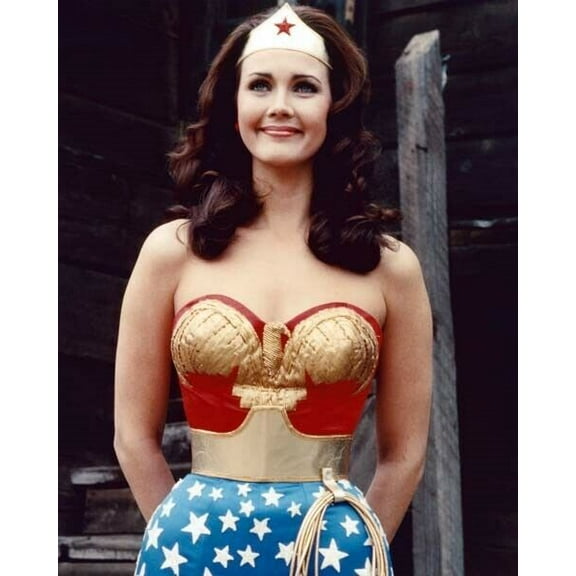Lynda Carter with lovely smile hands behind back Wonder Woman outfit poster