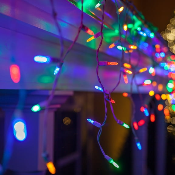 Wintergreen Lighting 70 LED Multi Color Icicle Lights, 7' White Wire Christmas Party Decorations Indoor-Outdoor