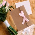 thumbnail image 1 of HAMPPLIES 50Pcs Kraft Paper Envelopes with Pink Ribbon Bow for Office and Parties, 1 of 6