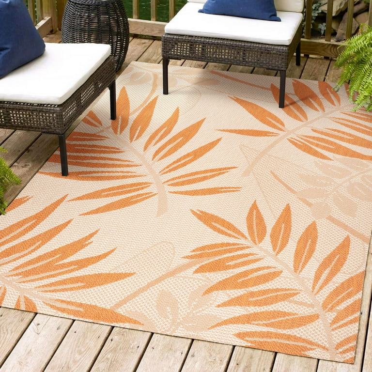 5' x 7' Ivory Green and Orange Palm Leaf Stain Resistant Indoor Outdoor Area Rug 5' x 7' Ivory Green and Orange Palm Leaf Stain Resistant Indoor Outdoor Area Rug