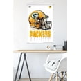 thumbnail image 5 of NFL Green Bay Packers - Drip Helmet 20 Wall Poster with Wooden Magnetic Frame, 22.375" x 34", 5 of 5