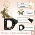 thumbnail image 3 of Llaveros de letra inicial del alfabeto Uxcell, llaveros lindos de resina con charm de colgante de letra D y borla de mariposa, 3 of 7