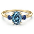 thumbnail image 3 of Gem Stone King 10K Yellow Gold Persian Blue Moissanite and Blue Created Sapphire 3-Stone Ring for Women | 1.66 Cttw | Oval 8X6MM | Gemstone Birthstone | Size 8, 3 of 6