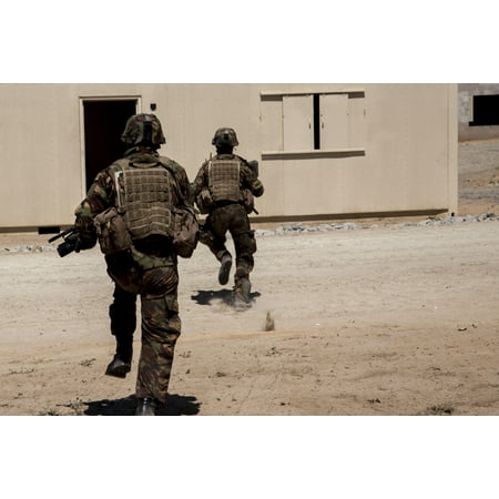 Blitz Paper - LAMINATED POSTER New Zealand soldiers run to a building during a training exercise during exercise Dawn Blitz aboard Poster Print 24 x 36