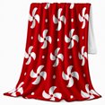 thumbnail image 2 of Red Peppermint Swirl Candy Flannel Blanket with white pinwheel pattern, dots, bold holiday living room sofa accent Home Decor, cheerful Gift for Christmas decor fans, 2 of 9