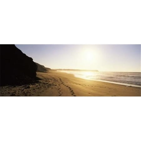 Sunset over the beach Lagos Faro District Algarve Portugal Poster Print by