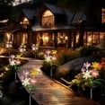 thumbnail image 4 of Luz solar para estacas de jardín de flores de lirio con flores artificiales para la decoración exterior de caminos, jardín, césped y patio, 4 of 6