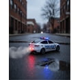 thumbnail image 2 of Carro De Pilas Transformable Con Vapor, Luz Y Sonido, Police, 2 of 9