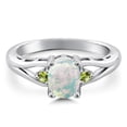 thumbnail image 3 of Gem Stone King 925 Sterling Silver White Simulated Opal and Green Peridot 3 Stone Engagement Ring for Women | 1.15 Cttw | Oval Cabochon 8X6MM | Round 2MM | Gemstone October Birthstone | Size 6, 3 of 6