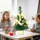 thumbnail image 4 of Adorno navideño retráctil mini de 30 cm | Decoración navideña de escritorio | Árbol de mesa de plástico ensamblado a mano con lazos y adornos navideños | Dorado, rojo, azul y verde, 4 of 6