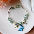 thumbnail image 2 of Nuevo temperamento tocador miel perla explosión flor cristal pulsera nicho femenino diseño japonés y coreano azul mariposa pulsera transfronteriza joyería mariposa uno, 2 of 2