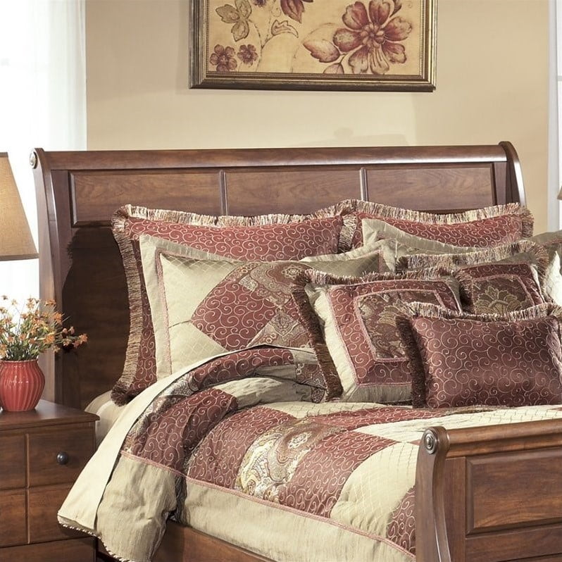 Ashley Furniture Timberline Wood Queen Sleigh Headboard in Warm Brown