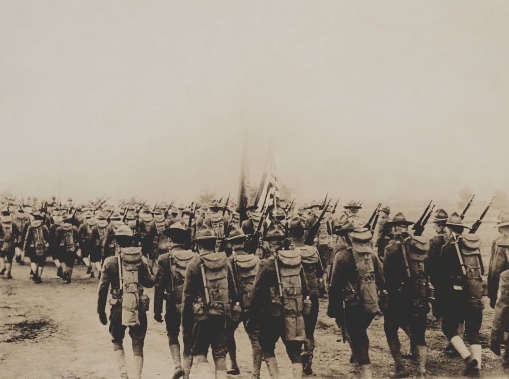 Rear View Of U S Army Expeditionary Force Soldiers Marching During 