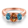 thumbnail image 3 of Gem Stone King 18K Rose Gold Plated Silver Ecstasy Mystic Topaz and London Blue Topaz Filigree Style 3 Stone Ring for Women (2.70 Cttw, Oval 8X6MM and 6X4MM, Size 5), 3 of 6