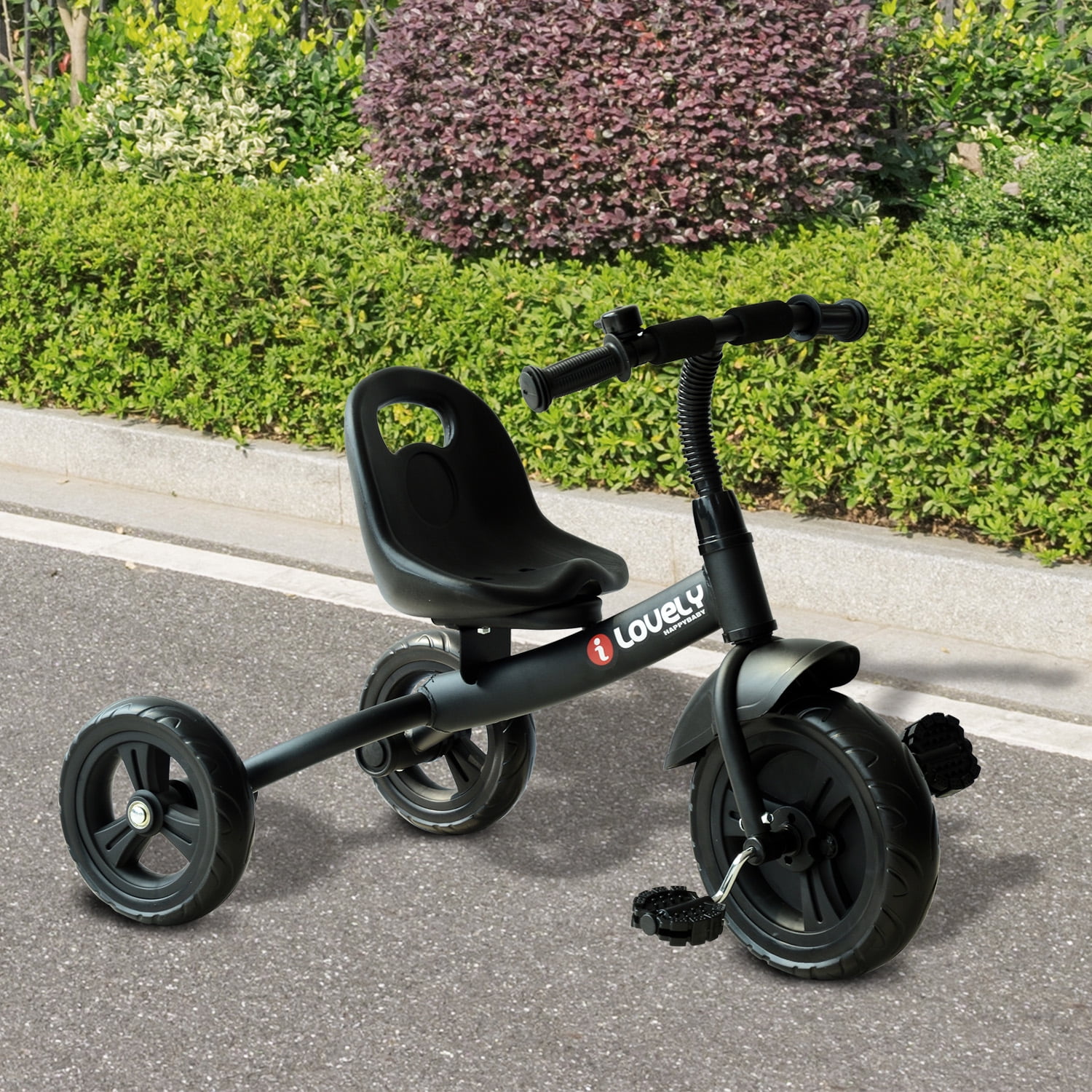 baby riding tricycle