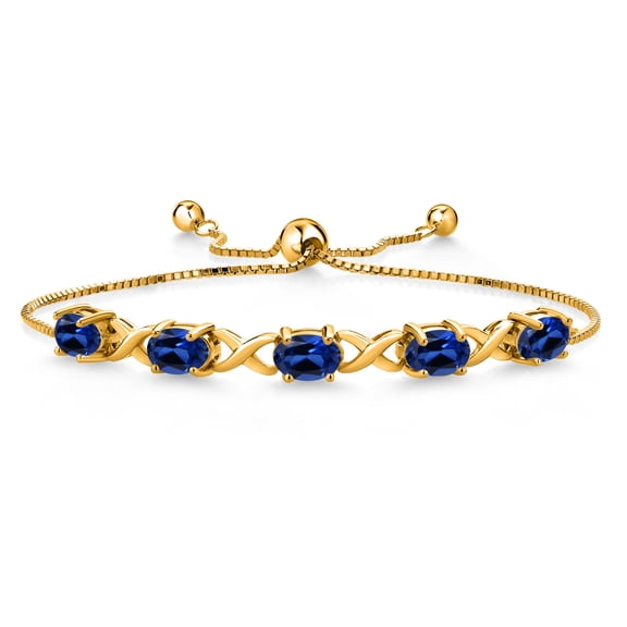Gem Stone King 18K Yellow Gold Plated Silver Blue Created Sapphire Bracelet for Women (5.00 Cttw, Gemstone September Birthstone, Oval 7X5MM, Fully Adjustable up to 9 inches)
