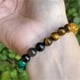 thumbnail image 4 of Pulsera de ojo de tigre Pulsera elástica con cuentas hecha a mano para hombre y mujer Pulsera verde para pareja, 4 of 8