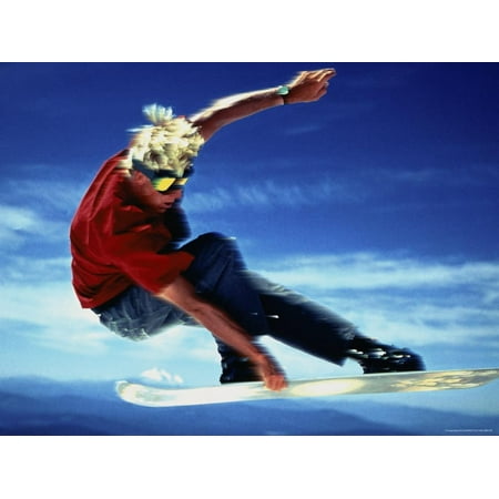 Teenage Boy Snowboarding in Mid-Air Print Wall