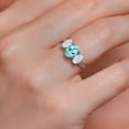 thumbnail image 4 of Gem Stone King 10K White Gold Blue Apatite White Moissanite and White Lab Grown Diamond 3 Stone Engagement Ring for Women (2.24 Cttw, Gemstone Birthstone, Available in Size 5, 6, 7, 8, 9), 4 of 5