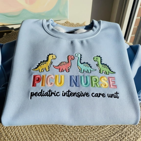 PICU Nurse Dinosaur Embroidered Sweatshirt: Pediatric Intensive Care Crewneck For Nurse