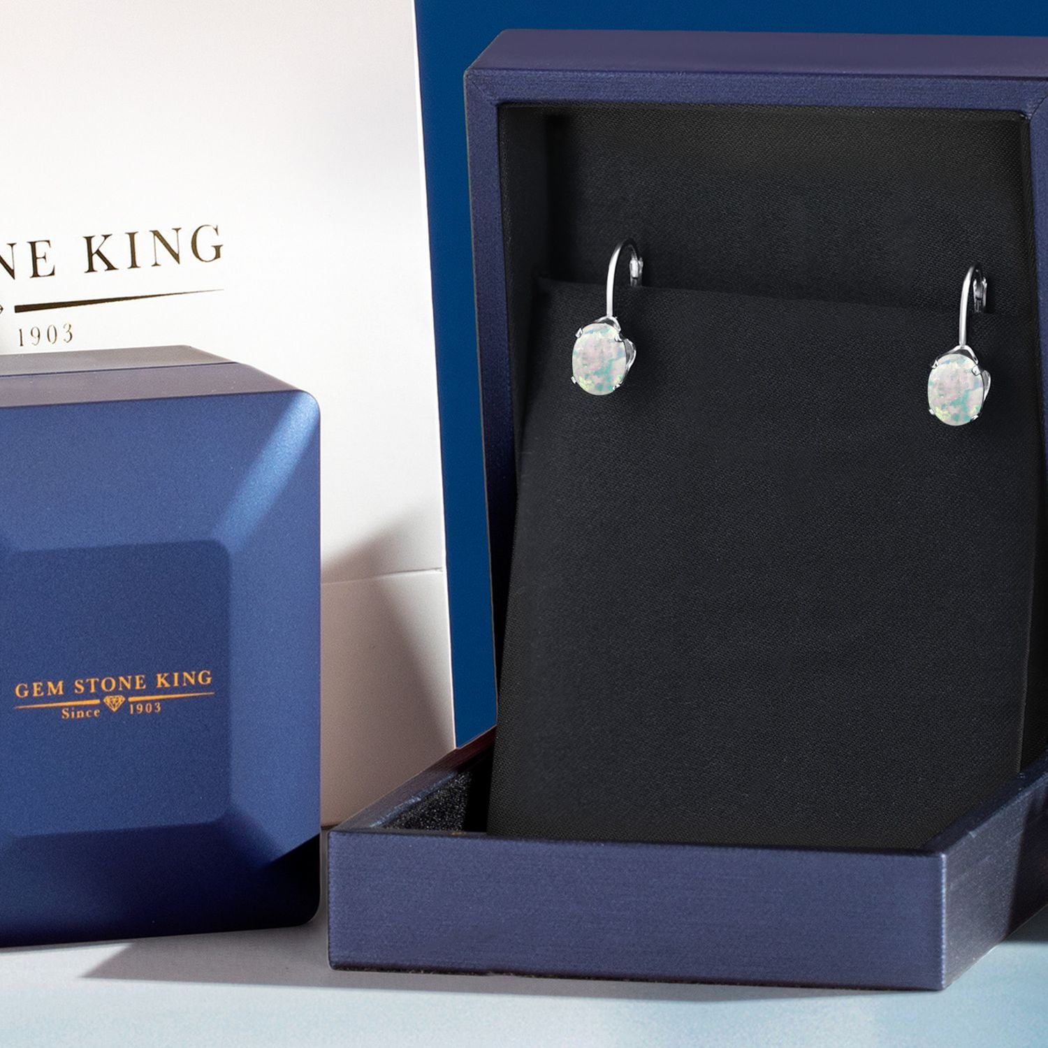 Gem Stone King 925 Sterling Silver Oval Cabochon White Simulated Opal Earrings for Women (2.10 Cttw, Oval 8X6MM)